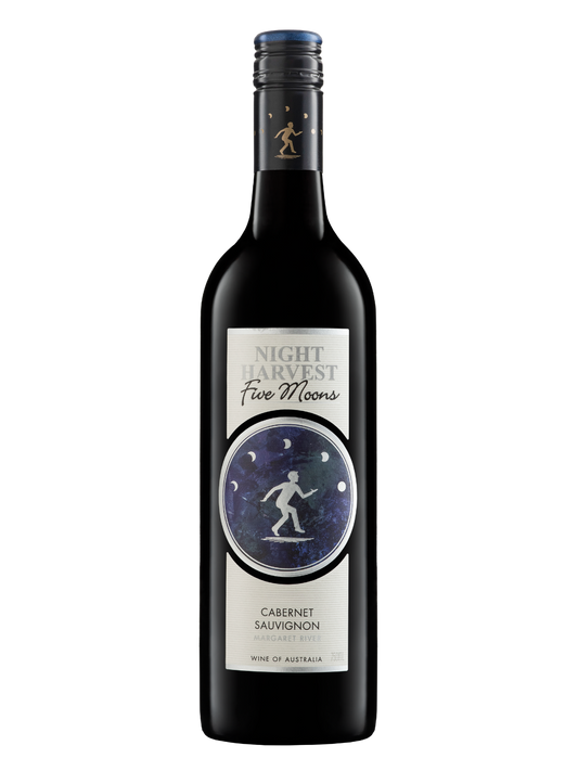A bottle of Night Harvest Five Moons Cabernet Sauvignon red wine, featuring a dark glass bottle with a black label and a white label with a blue circular graphic of a running figure under a moonlit sky.